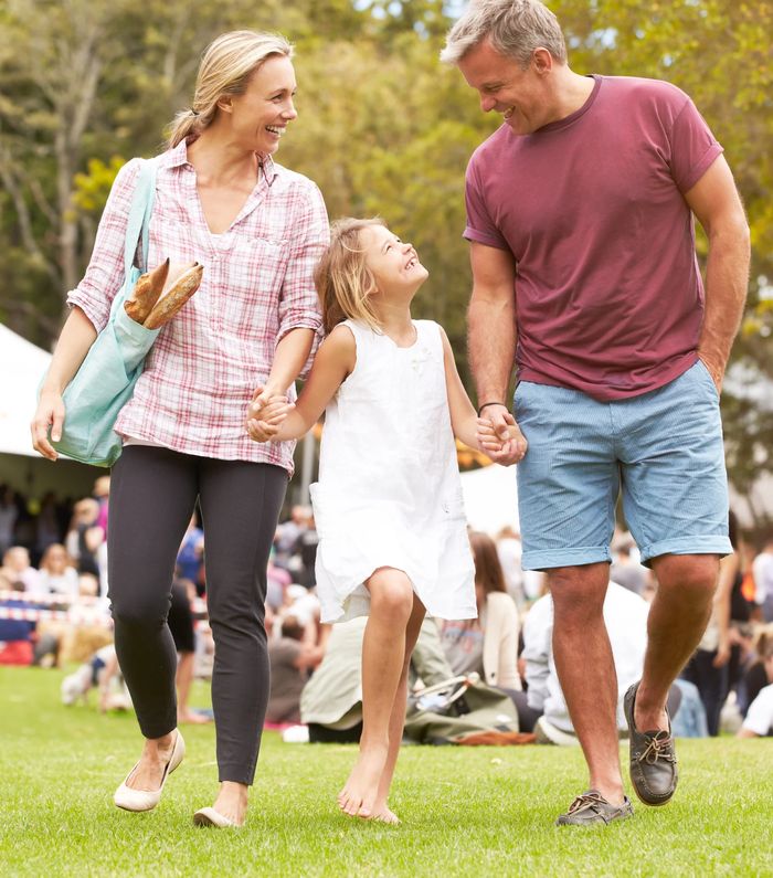 A family enjoying a day out at a community fair